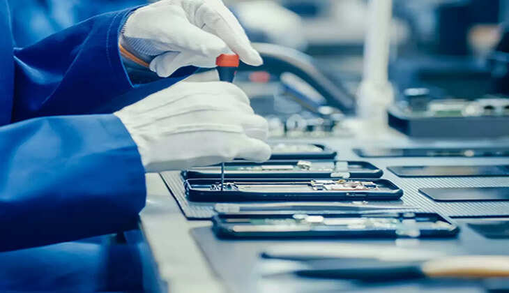  High Tech Factory Facility with more Employees in the Background.