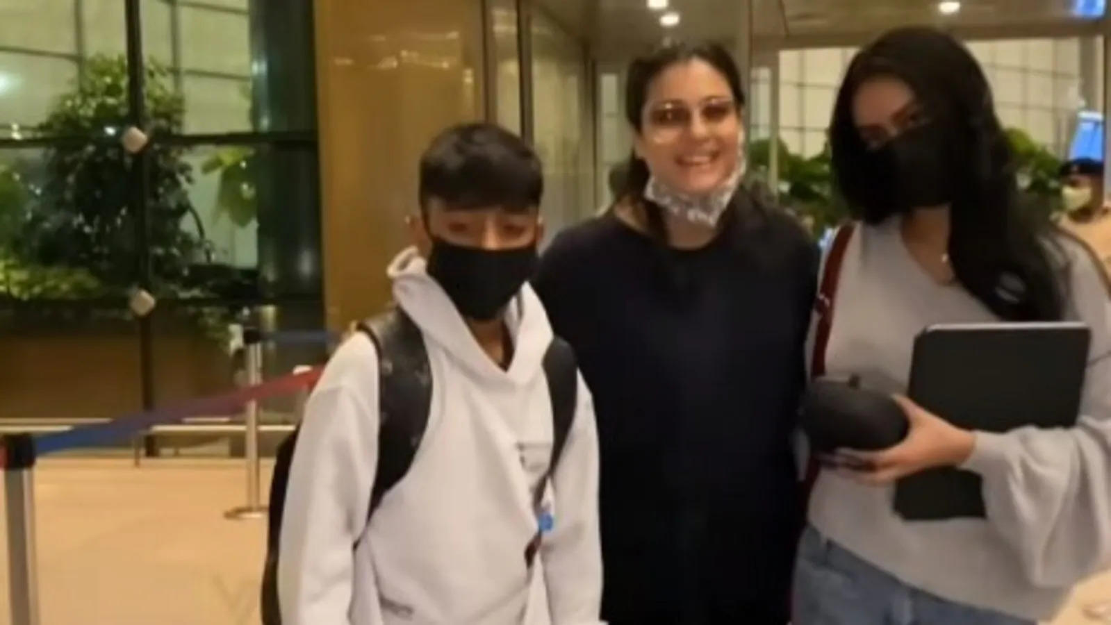 Kajol with her kids at the airport