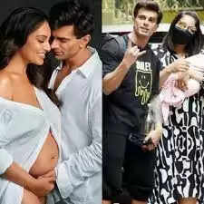 Bipasha Basu and Karan Singh Grover Happily Pose with Their Daughter Devi as They Take her Home