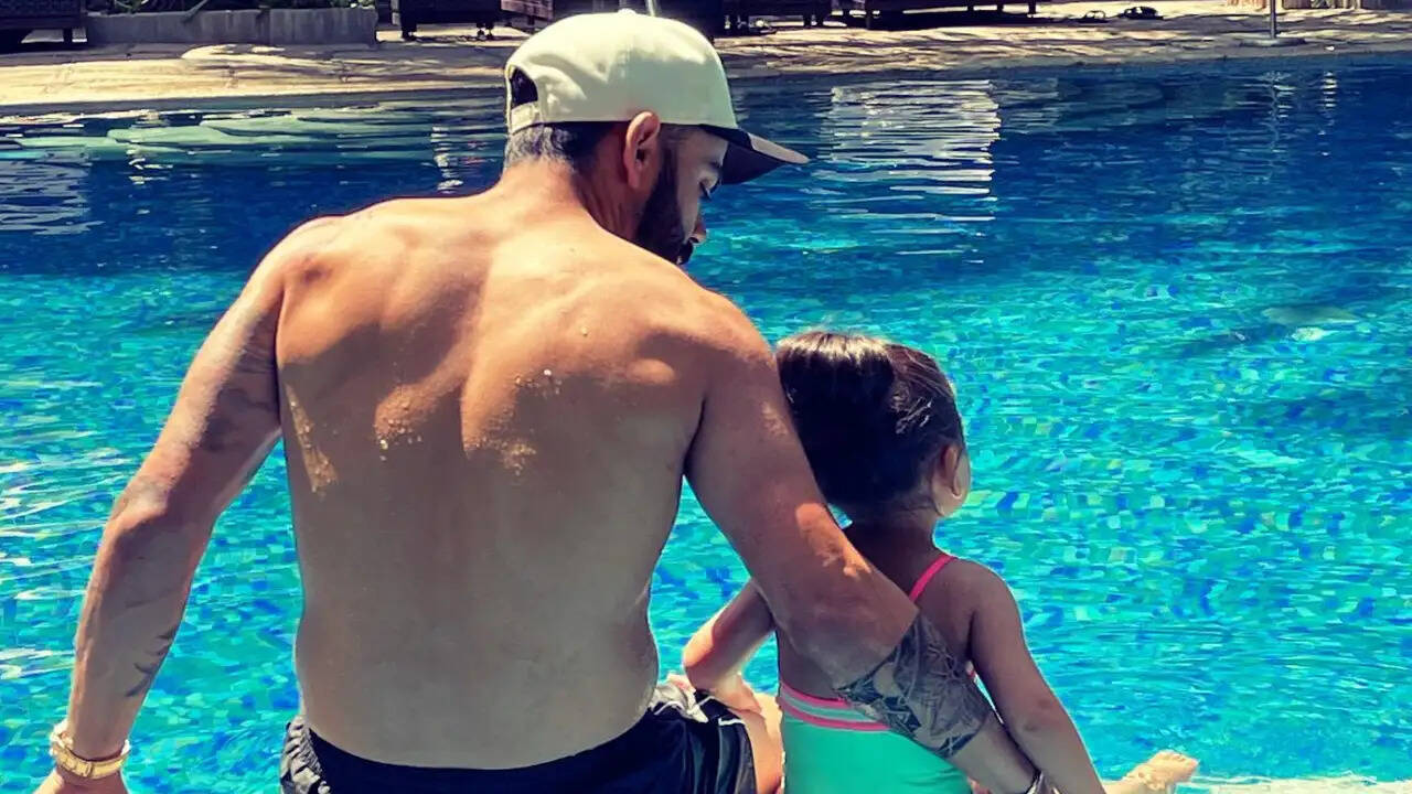 Virat Kohli Spends his Summer Afternoon Swimming with Vamika